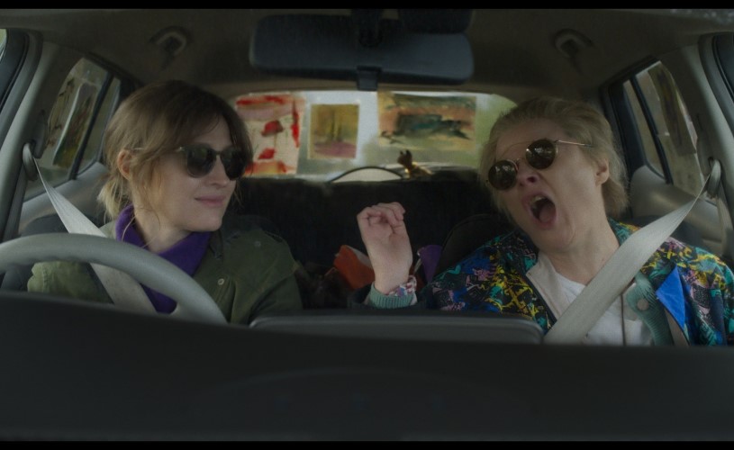 Two women sat in a car